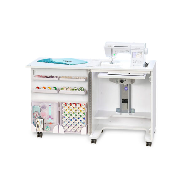 Compact Sewing Cabinet in White from Tailormade Sewing Furniture available at Sewing Center. Compact features flat bed sewing, snag-free hinges, and in-door notion storage. Now with hassle-free home delivery.