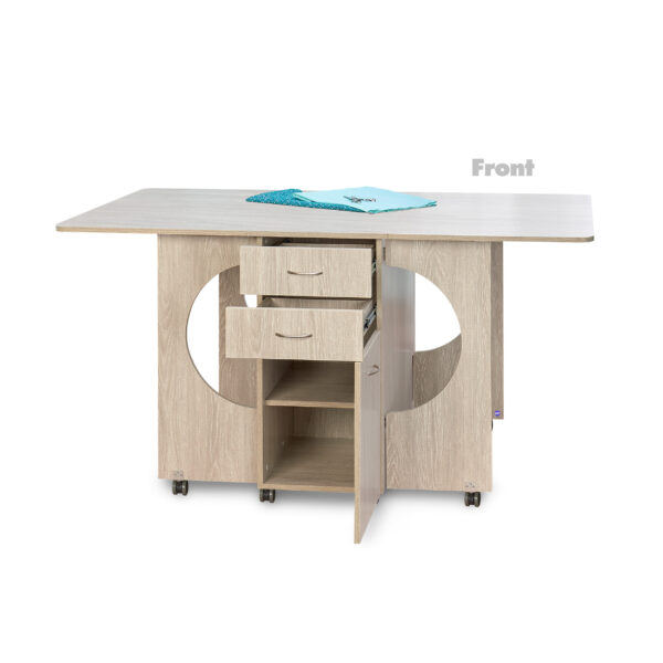 Cutting Table in Grey Oak from Tailormade Sewing Furniture shown in open position - available at Sewing Center. Cutting Table features an expansive cutting worksurface, front and back storage, and efficient gatelegs. Now with hassle-free home delivery.